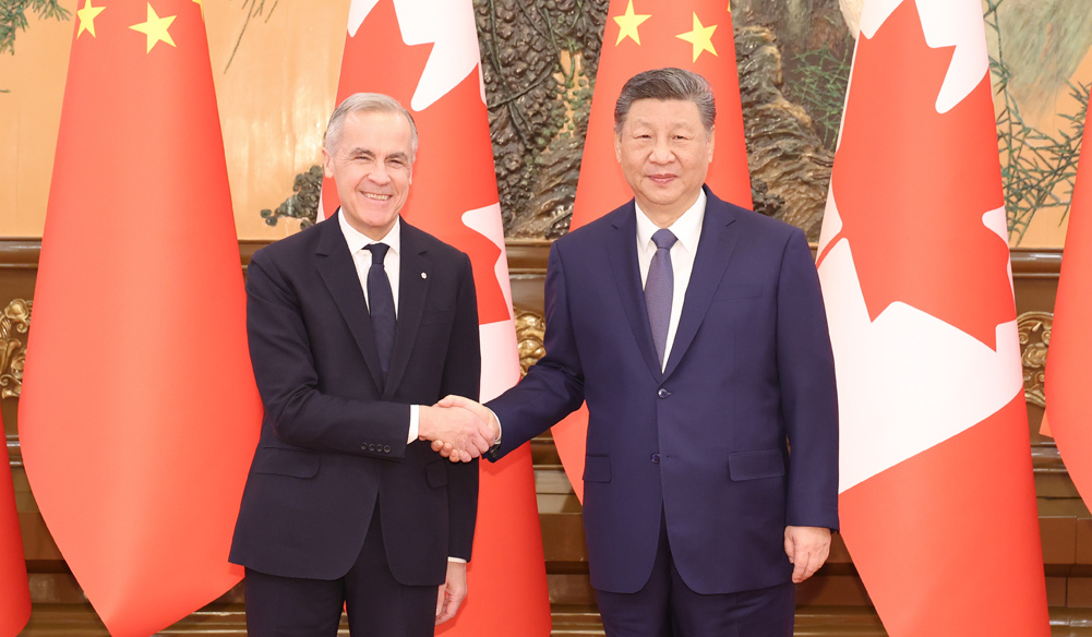 习近平会见加拿大总理卡尼